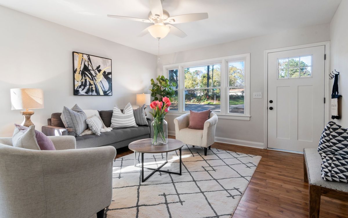 Bright and elegant living room featuring modern decor and cozy furnishings.